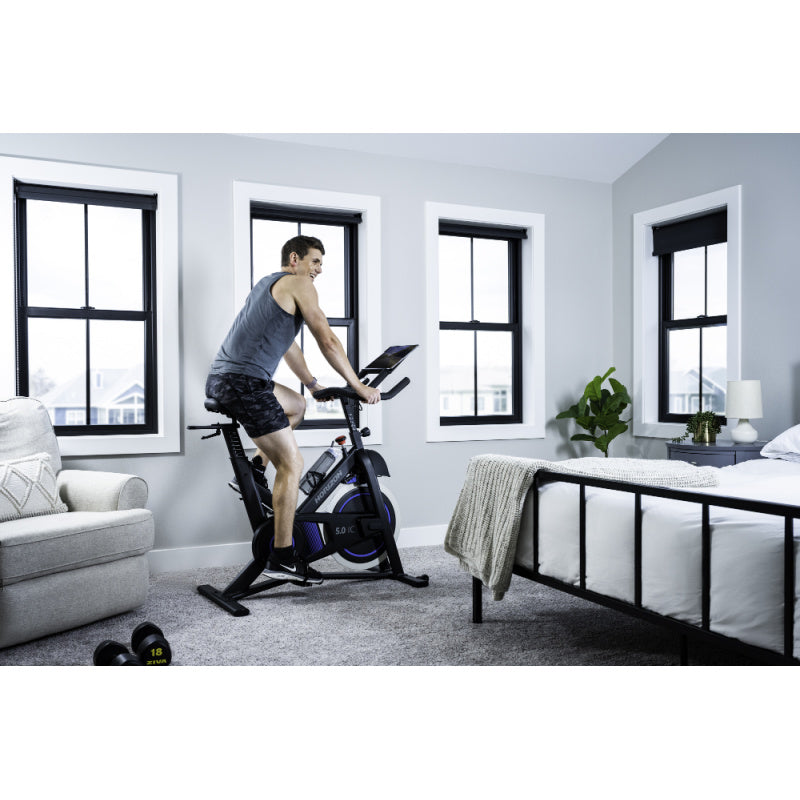 Horizon Fitness 5.0 IC Spin Bike with Bluetooth lifestyle view male