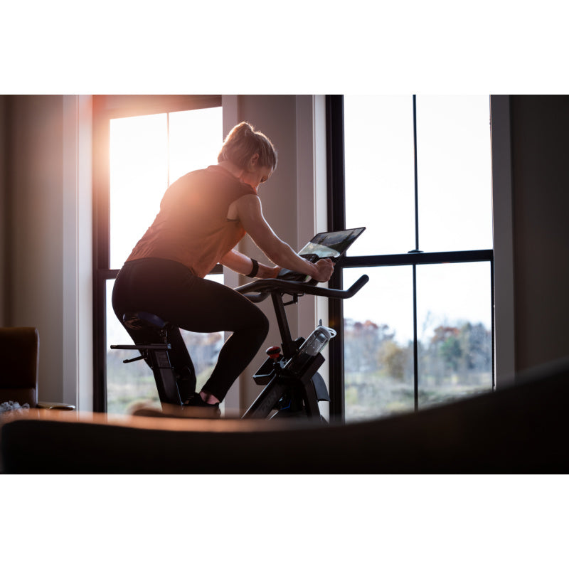 Horizon Fitness 7.0IC Spin Bike with Bluetooth female lifestyle view